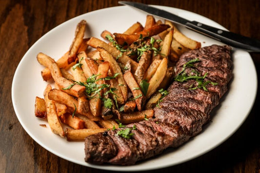 Côte de bœuf au four et frites au romarin